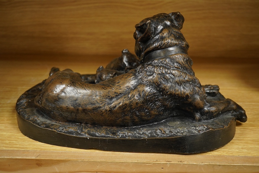 After W. Wolfe, a resin Bull Mastiff dog group, 34cm wide. Condition - poor